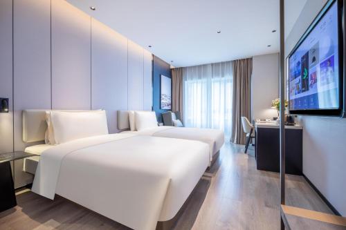 Imagen de la habitación del Hotel Atour Kunming Guangfu Road Haile World. Foto 18
