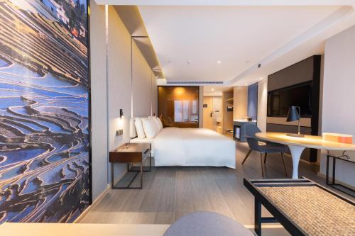 Imagen de la habitación del Hotel Atour Kunming Hi-tech Wuyue Plaza. Foto 11