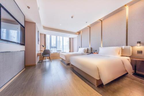 Imagen de la habitación del Hotel Atour Kunming Hi-tech Wuyue Plaza. Foto 13