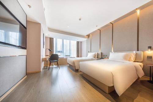 Imagen de la habitación del Hotel Atour Kunming Hi-tech Wuyue Plaza. Foto 16
