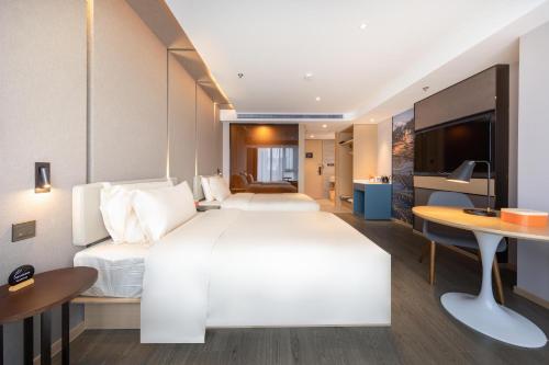 Imagen de la habitación del Hotel Atour Kunming Hi-tech Wuyue Plaza. Foto 17