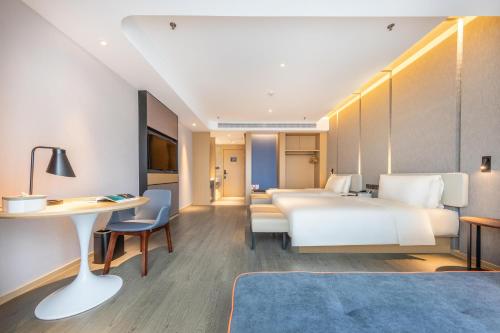 Imagen de la habitación del Hotel Atour Kunming Nanyue City. Foto 18