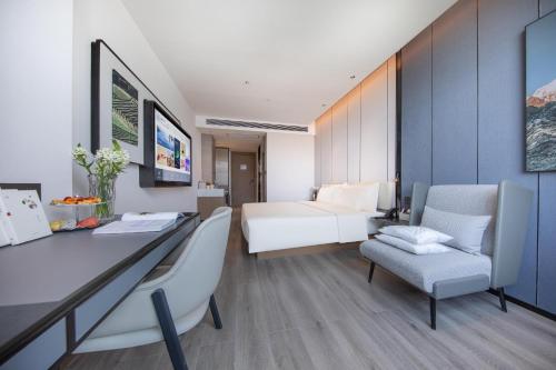 Imagen de la habitación del Hotel Atour Kunming Railway Station Joy City. Foto 17