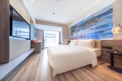 Imagen de la habitación del Hotel Atour Kunming South High Speed ​​Railway Station University Town. Foto 15