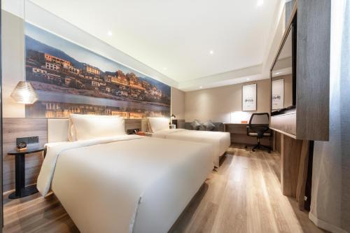 Imagen de la habitación del Hotel Atour Kunming South High Speed ​​Railway Station University Town. Foto 16