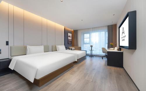 Imagen de la habitación del Hotel Atour Kunming Tongde Plaza Beijing Road. Foto 4