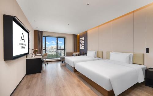 Imagen de la habitación del Hotel Atour Kunming Tongde Plaza Beijing Road. Foto 5
