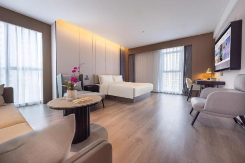 Imagen de la habitación del Hotel Atour Kunming Xiaokang Avenue. Foto 11