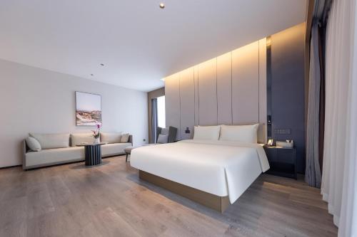 Imagen de la habitación del Hotel Atour Kunming Xiaokang Avenue. Foto 13