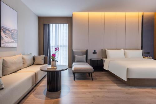 Imagen de la habitación del Hotel Atour Kunming Xiaokang Avenue. Foto 14