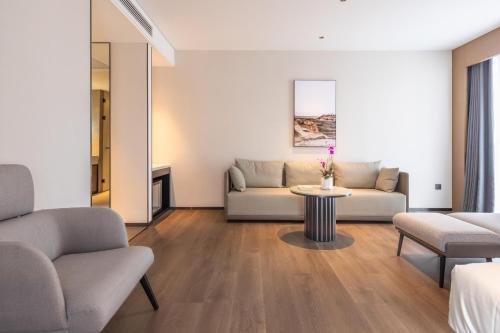 Imagen de la habitación del Hotel Atour Kunming Xiaokang Avenue. Foto 15