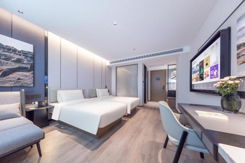 Imagen de la habitación del Hotel Atour Kunming Yunnan-Burma Avenue. Foto 14