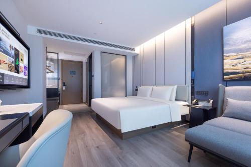 Imagen de la habitación del Hotel Atour Kunming Yunnan-Burma Avenue. Foto 15