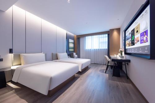 Imagen de la habitación del Hotel Atour Kunming Yunnan-Burma Avenue. Foto 16