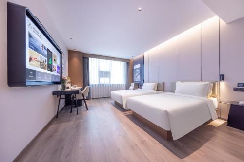 Imagen de la habitación del Hotel Atour Kunming Yunnan-Burma Avenue. Foto 17