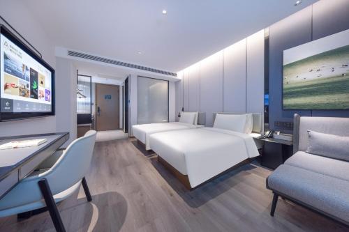 Imagen de la habitación del Hotel Atour Kunming Yunnan-Burma Avenue. Foto 18