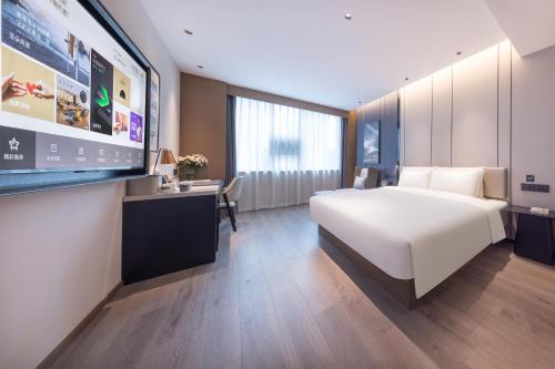 Imagen de la habitación del Hotel Atour Kunming Yunnan-Burma Avenue. Foto 19