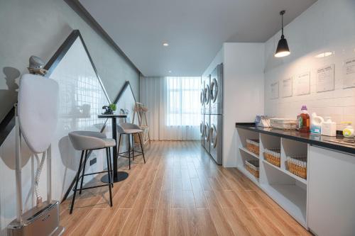 Imagen general del Hotel Atour Lanzhou Xigu. Foto 6