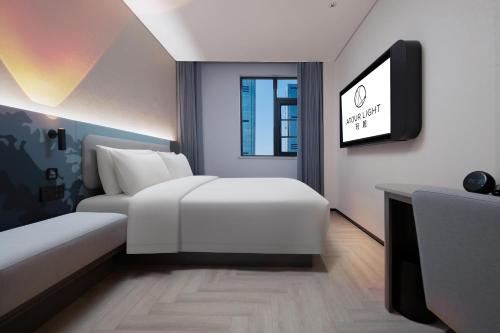 Imagen de la habitación del Hotel Atour Light Changsha IFC Huangxing Road Pedestrian Street. Foto 13