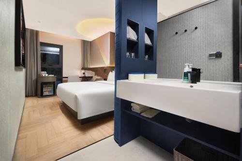 Imagen de la habitación del Hotel Atour Light Changsha IFC Huangxing Road Pedestrian Street. Foto 15