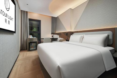 Imagen de la habitación del Hotel Atour Light Changsha IFC Huangxing Road Pedestrian Street. Foto 17