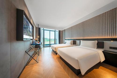 Imagen de la habitación del Hotel Atour Light Chongqing Hechuan Sports Center. Foto 8