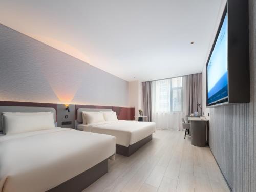 Imagen de la habitación del Hotel Atour Light Dalian Zhongshan Square Renming Road. Foto 15
