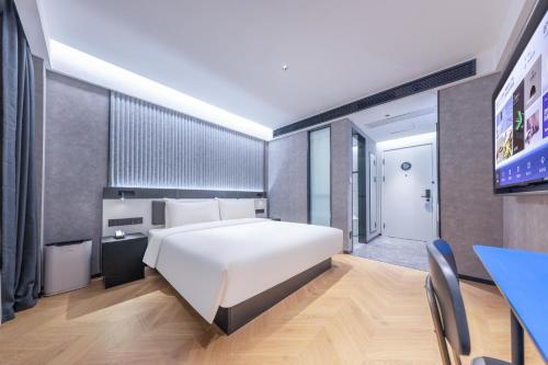 Imagen de la habitación del Hotel Atour Light Fuzhou Sanfang Qixiang. Foto 12