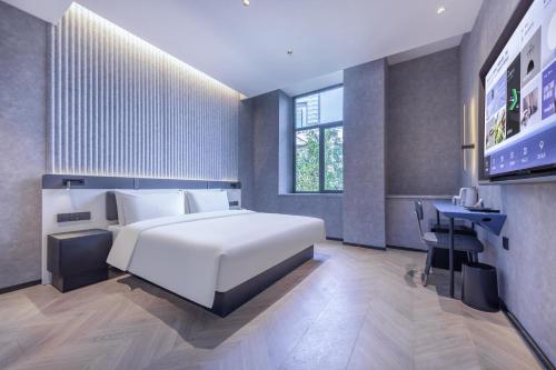 Imagen de la habitación del Hotel Atour Light Fuzhou Sanfang Qixiang. Foto 14
