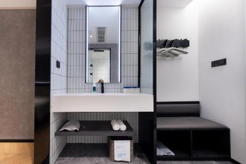 Imagen de la habitación del Hotel Atour Light Fuzhou Sanfang Qixiang. Foto 15