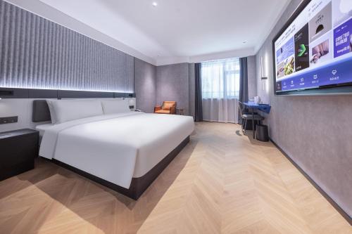 Imagen de la habitación del Hotel Atour Light Fuzhou Sanfang Qixiang. Foto 16