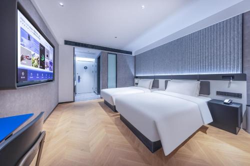 Imagen de la habitación del Hotel Atour Light Fuzhou Sanfang Qixiang. Foto 17
