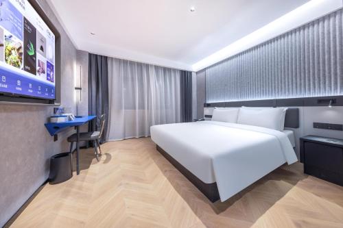 Imagen de la habitación del Hotel Atour Light Fuzhou Sanfang Qixiang. Foto 18