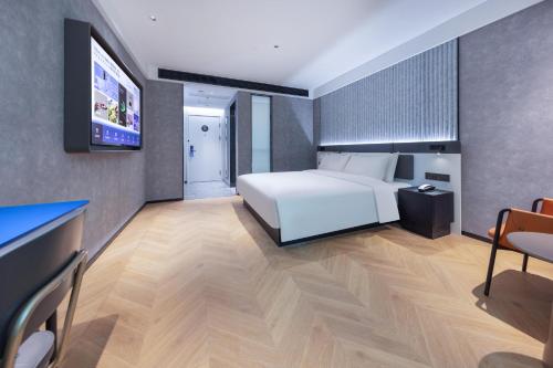 Imagen de la habitación del Hotel Atour Light Fuzhou Sanfang Qixiang. Foto 19