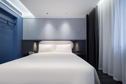 Imagen de la habitación del Hotel Atour Light Guiyang Huaguoyuan Cultural and Creative Park. Foto 3