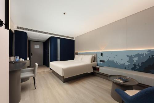Imagen de la habitación del Hotel Atour Light Haikou Guomao Wanlv Garden. Foto 16