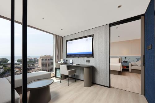 Imagen de la habitación del Hotel Atour Light Haikou Guomao Wanlv Garden. Foto 19