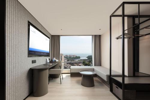 Imagen de la habitación del Hotel Atour Light Haikou Guomao Wanlv Garden. Foto 20