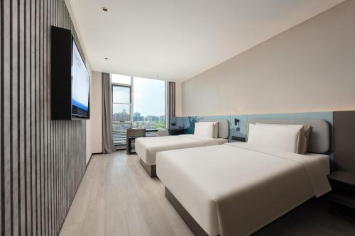 Imagen de la habitación del Hotel Atour Light Hangzhou Gongshu Grand Canal. Foto 20