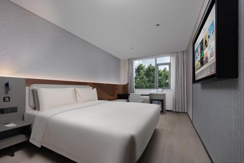 Imagen de la habitación del Hotel Atour Light Hepingmen Yanta North Road. Foto 10