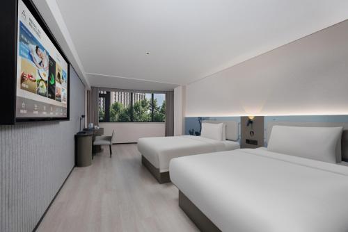 Imagen de la habitación del Hotel Atour Light Hepingmen Yanta North Road. Foto 13