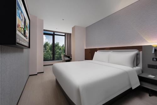Imagen de la habitación del Hotel Atour Light Hepingmen Yanta North Road. Foto 14