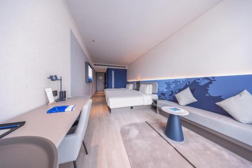 Imagen de la habitación del Hotel Atour Light Hotel Shanghai Daning International Shibei High-tech Park. Foto 14
