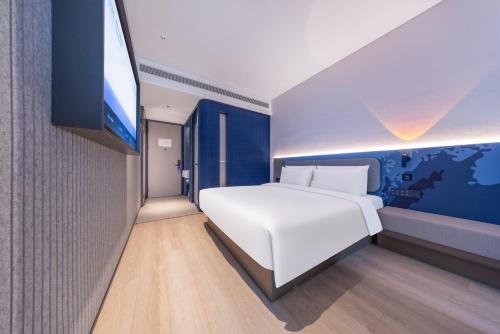 Imagen de la habitación del Hotel Atour Light Hotel Shanghai Daning International Shibei High-tech Park. Foto 15