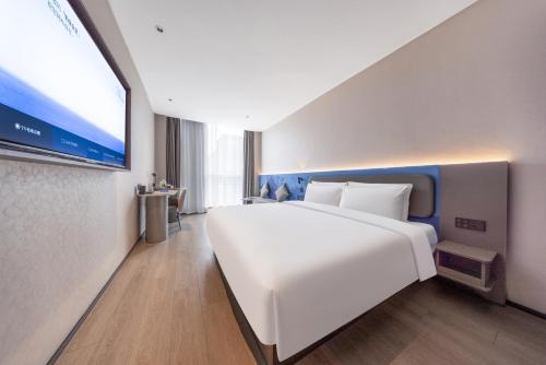Imagen de la habitación del Hotel Atour Light Hotel Shanghai Daning International Shibei High-tech Park. Foto 17