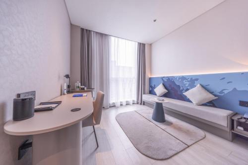 Imagen de la habitación del Hotel Atour Light Hotel Shanghai Daning International Shibei High-tech Park. Foto 18