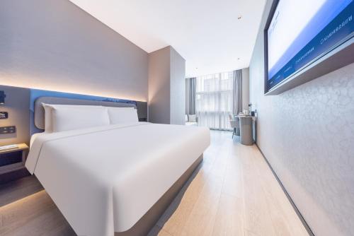Imagen de la habitación del Hotel Atour Light Hotel Shanghai Daning International Shibei High-tech Park. Foto 20