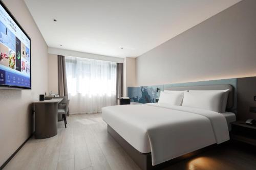 Imagen de la habitación del Hotel Atour Light Huzhou Deqing Moganshan. Foto 10