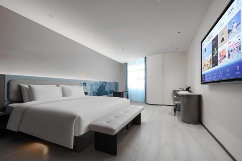 Imagen de la habitación del Hotel Atour Light Huzhou Deqing Moganshan. Foto 13