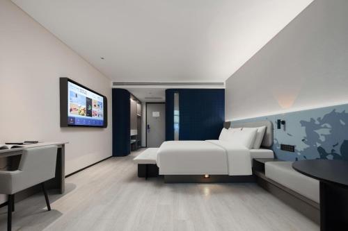 Imagen de la habitación del Hotel Atour Light Huzhou Deqing Moganshan. Foto 14